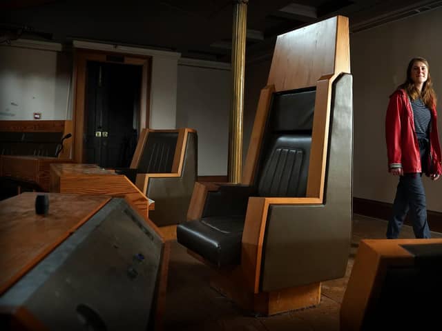 Georgia Vullinghs, Assistant Curator of Modern and Contemporary History, at the National Museum of Scotland, alongside the "Speaker's Chair" at the old Royal High School building on Calton Hill. Picture: Stewart Attwood