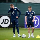 Billy Gilmour (centre) in upbeat mood during a Scotland training session on Sunday with Scott McTominay (left) and Liam Cooper (right). (Photo by Paul Devlin / SNS Group)