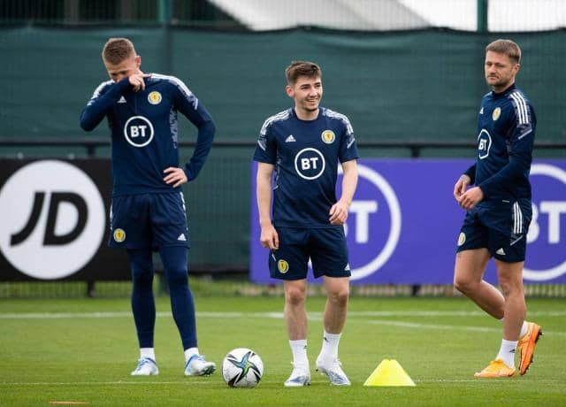 Billy Gilmour (centre) in upbeat mood during a Scotland training session on Sunday with Scott McTominay (left) and Liam Cooper (right). (Photo by Paul Devlin / SNS Group)