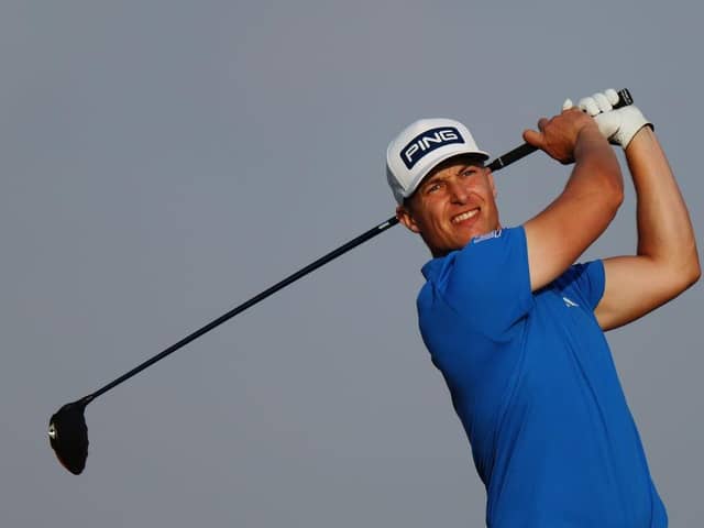 Calum Hill tees off on the fifth hole during day one of the Abu Dhabi HSBC Championship at Yas Links. Picture: Andrew Redington/Getty Images.