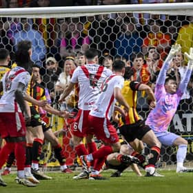 Airdrie's Callum Fordyce hits the bar late on with a chance against Partick Thistle.