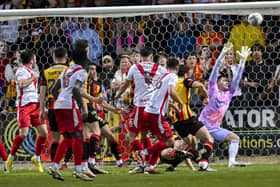 Airdrie's Callum Fordyce hits the bar late on with a chance against Partick Thistle.