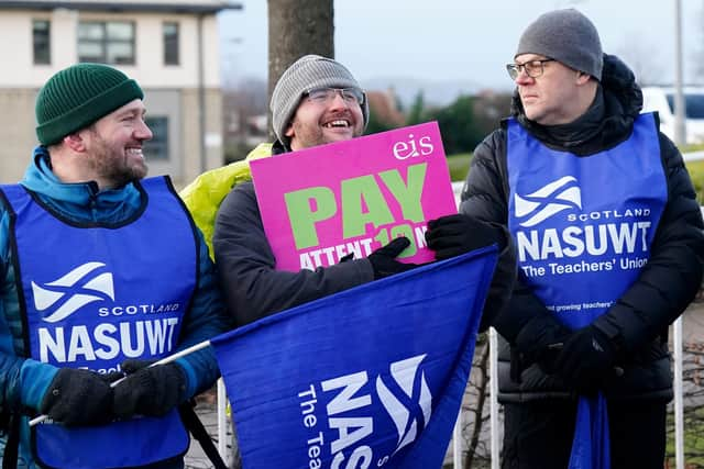 Members of the EIS and NASUWT unions, join the picket line at Craigmount High School in Edinburgh. Secondary schools around Scotland are shut as members of the EIS and SSTA unions take strike action in a dispute over pay. Picture date: Wednesday January 11, 2023.