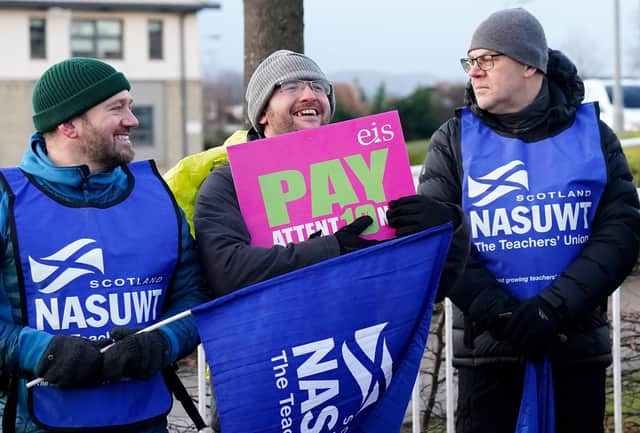 Members of the EIS and NASUWT unions, join the picket line at Craigmount High School in Edinburgh. Secondary schools around Scotland are shut as members of the EIS and SSTA unions take strike action in a dispute over pay. Picture date: Wednesday January 11, 2023.