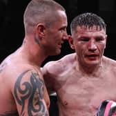 Willie Limond (right) and Ricky Burns embrace at the end of the Battle of the Legends fight at the Braehead Arena, on September 01, 2023, in Glasgow, Scotland. (Photo by Rob Casey / SNS Group)