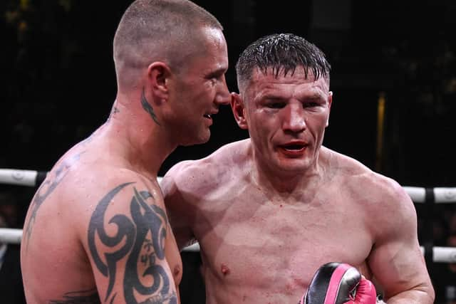 Willie Limond (right) and Ricky Burns embrace at the end of the Battle of the Legends fight at the Braehead Arena, on September 01, 2023, in Glasgow, Scotland. (Photo by Rob Casey / SNS Group)