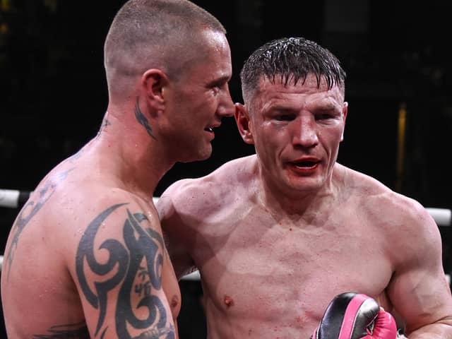 Willie Limond (right) and Ricky Burns embrace at the end of the Battle of the Legends fight at the Braehead Arena, on September 01, 2023, in Glasgow, Scotland. (Photo by Rob Casey / SNS Group)