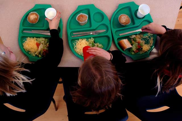 Pupils enjoying school dinners