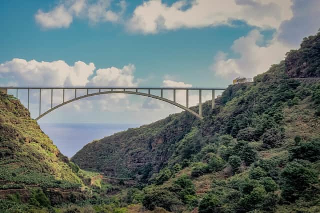 This arch bridge built over the Los Tilos ravine located on the Canary Island of La Palma is the longest and highest arch bridge ever built in Spain. Pic: Shutterstock / KevinN