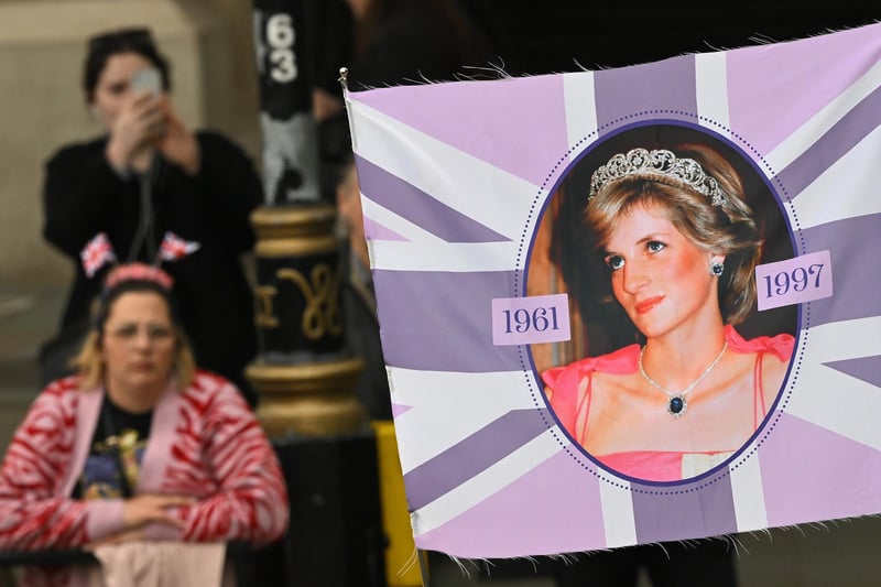 A banner on the route of the procession in London ahead of the coronation of King Charles III and Queen Camilla on Saturday.