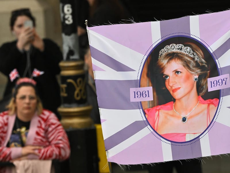 A banner on the route of the procession in London ahead of the coronation of King Charles III and Queen Camilla on Saturday.