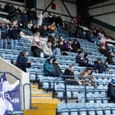 Large empty spaces were apparent in the home stands during a Scottish Cup match between Dundee and Rangers.
