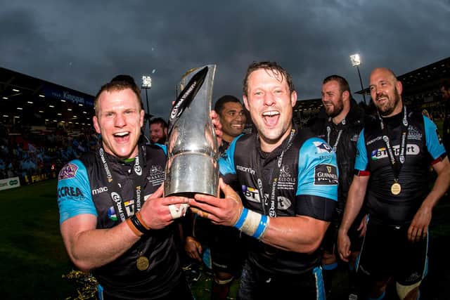 Chris Fusaro, left, and Pete Horne celebrate Glasgow Warriors' win over Munster in the 2015 Pro12 final. The pair had come through the ranks together at Bell Baxter High School.