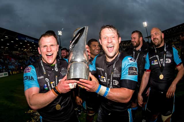 Chris Fusaro, left, and Pete Horne celebrate Glasgow Warriors' win over Munster in the 2015 Pro12 final. The pair had come through the ranks together at Bell Baxter High School.
