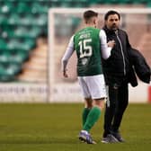 Hibernian's Kevin Nisbet greets Cove Rangers manager Paul Hartley after the final whistle (Picture: Andrew Milligan/PA Wire)