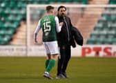 Hibernian's Kevin Nisbet greets Cove Rangers manager Paul Hartley after the final whistle (Picture: Andrew Milligan/PA Wire)