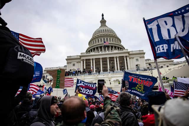 Donald Trump's supporters storm the US Capitol in an attempt to stop the ratification of Joe Biden's election as US president (Picture: Samuel Corum/Getty Images)