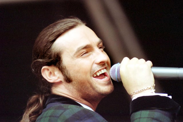 Marti Pellow, lead singer with Wet Wet Wet at the Radio 1 roadshow at Lamlash on the island of Arran in September 1992. The band would go on to spend 15 weeks at the top of the UK charts in 1994 with their cover of Love Is All Around.