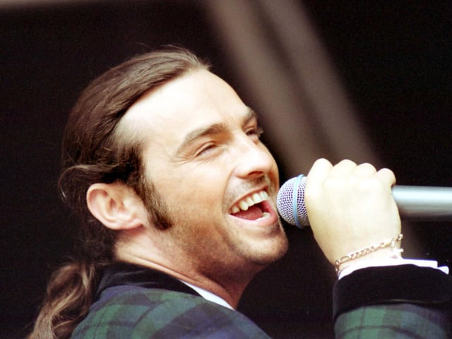 Marti Pellow, lead singer with Wet Wet Wet at the Radio 1 roadshow at Lamlash on the island of Arran in September 1992. The band would go on to spend 15 weeks at the top of the UK charts in 1994 with their cover of Love Is All Around.