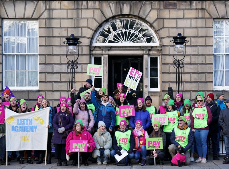 Members of the EIS demonstrate outside Bute House in Edinburgh as teachers from secondary schools around Scotland are shut as members of the EIS and SSTA unions take strike action in a dispute over pay. Picture date: Wednesday January 11, 2023.