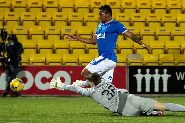 Alfredo Morelos goes down under the attentions of Livingston goalkeeper Max Stryjek. Picture: SNS