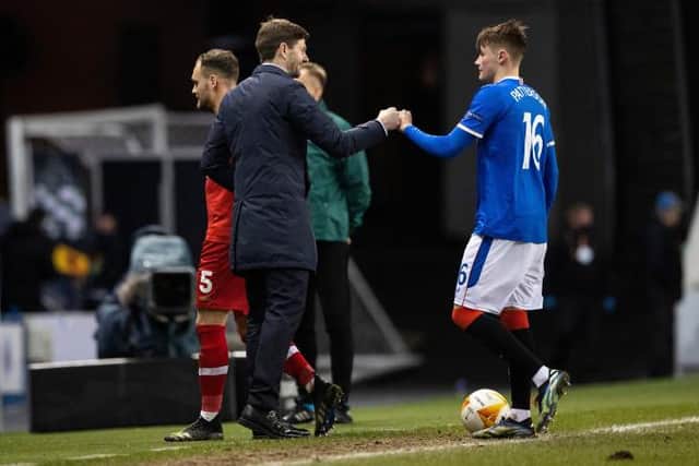 Rangers manager Steven Gerrard congratulates teenage full-back Nathan Patterson at the end of the 5-2 Europa League win against Royal Antwerp at Ibrox. (Photo by Craig Williamson / SNS Group)