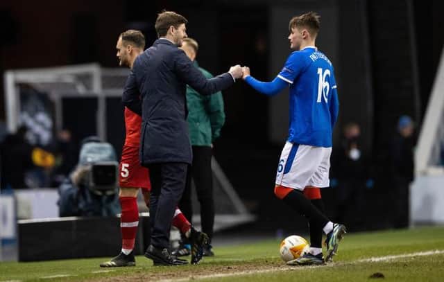 Rangers manager Steven Gerrard congratulates teenage full-back Nathan Patterson at the end of the 5-2 Europa League win against Royal Antwerp at Ibrox. (Photo by Craig Williamson / SNS Group)