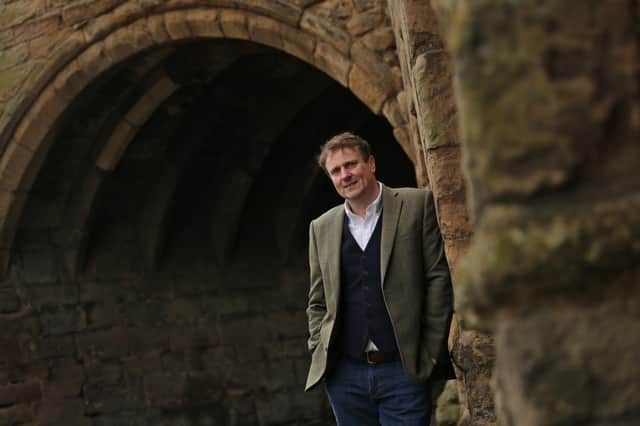 Peter Proud at Dunfermline Abbey - he went to school in the town, and says his early morning milk round taught him key business lessons. Picture: Stewart Attwood.