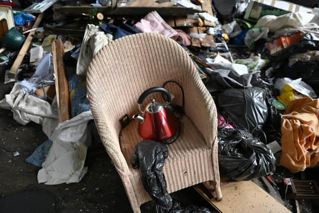 Baths, asbestos, washing machines, fridges and huge piles of domestic rubbish were illegally dumped under the M8 in the east end of Glasgow last year. Picture: John Devlin