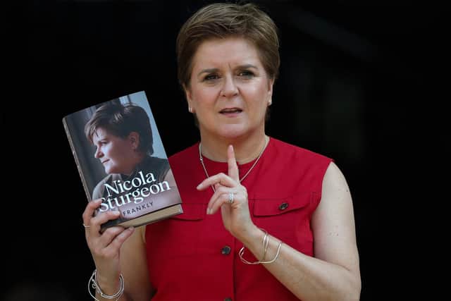 Nicola Sturgeon with her new memoir, Frankly. Picture: Jeff J Mitchell/Getty Images