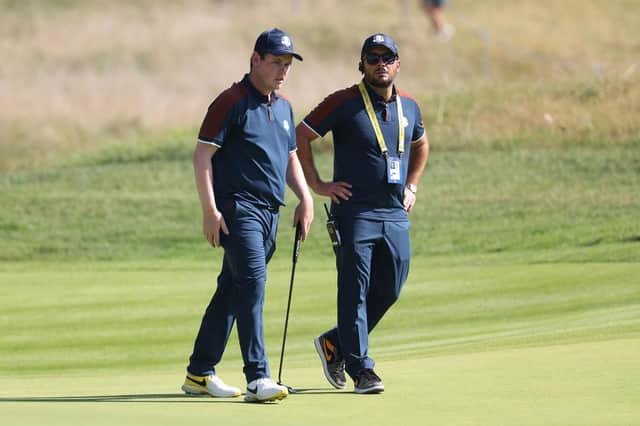 Bob MacIntyre chats to Team Europe vice captain Francesco Molinari on the final practice day for the 44th Ryder Cup at Marco Simone Golf Club in Rome. Picture: Richard Heathcote/Getty Images.