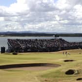 USA's Collin Morikawa, Northern Ireland's Rory McIlroy and USA's Xander Schauffele on the 7th green during day two of The Open at the Old Course, St Andrews.