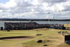 USA's Collin Morikawa, Northern Ireland's Rory McIlroy and USA's Xander Schauffele on the 7th green during day two of The Open at the Old Course, St Andrews.
