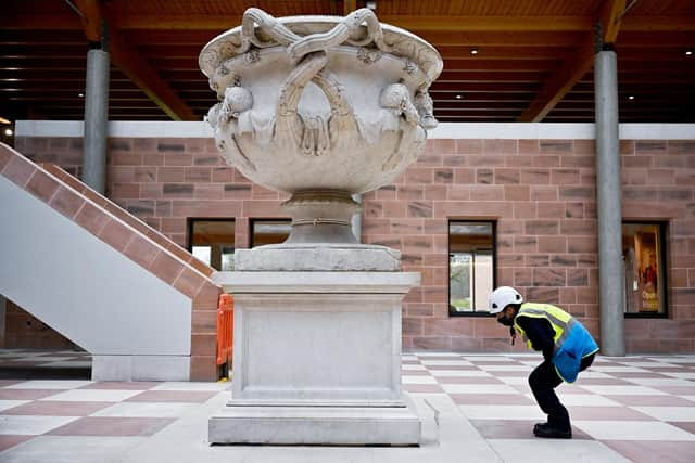 GLASGOW, SCOTLAND - FEBRUARY 08: Members of staff and workers at The Burrell Collection begin the finishing touches to the refurbished museum on February 08, 2022 in Glasgow, Scotland. The collection is named after the shipping magnate Sir William Burrell (1861 to 1958) who amassed more than 9,000 objects spanning 6,000 years of history. It includes work by major artists including Rodin, Degas and Cézanne plus important examples of late medieval art, Chinese and Islamic art, ancient civilizations. It reopens in March 2022. (Photo by Jeff J Mitchell/Getty Images)