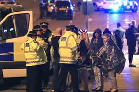 Police at the Manchester Arena at the end of a concert by US star Ariana Grande in 2017.  The Manchester Arena Inquiry has published its report into the emergency services' response to the terror attack in 2017