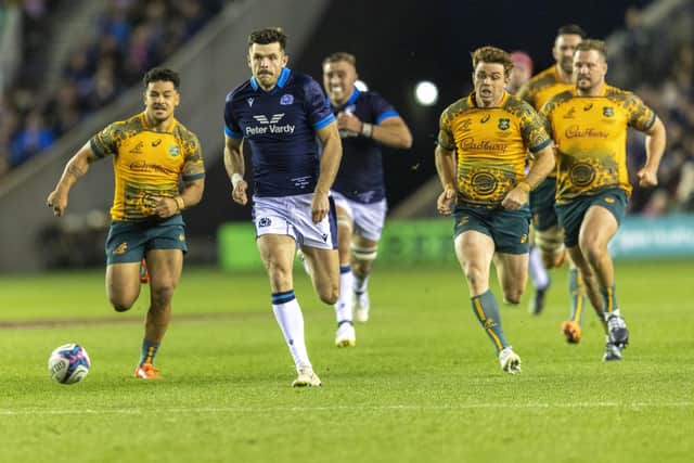 Scotland's Blair Kinghorn kicks the ball on for a stunning solo try against Australia. Picture: Robert Perry/PA Wire