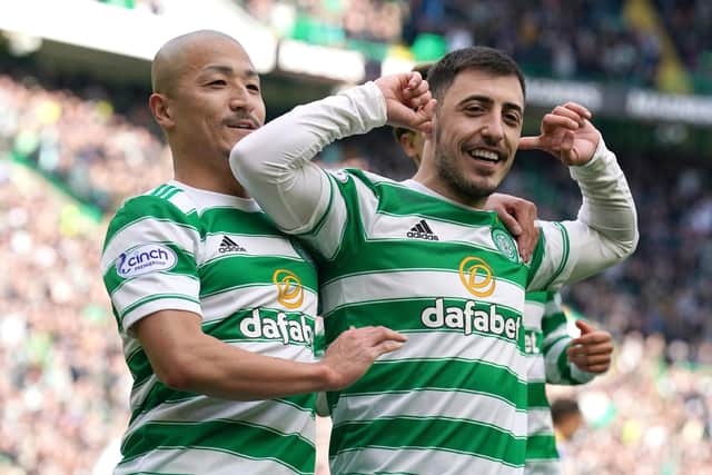 Celtic's Josip Juranovic (right) celebrates his side's fourth goal against St Johnstone and says his team-mates are ready for Rangers in the Scottish Cup next weekend. (Photo: Andrew Milligan/PA Wire).