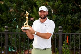 Scottie Scheffler celebrates with the trophy after winning The Players Championship for the second year running at TPC Sawgrass. Picture: Kevin C. Cox/Getty Images.