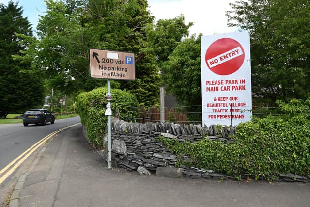 Temporary rules are in place with permit-only parking allowed in the centre of Luss but a new scheme under consideration will leave motorists with three penalty points if they try and enter the heart of the village. PIC:  John Devlin.