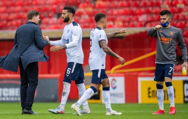Rangers manager Steven Gerrard congratulates defender Connor Goldson at the end of the 1-0 win against Aberdeen at Pittodrie on the opening day of the season. (Photo by Craig Williamson / SNS Group)