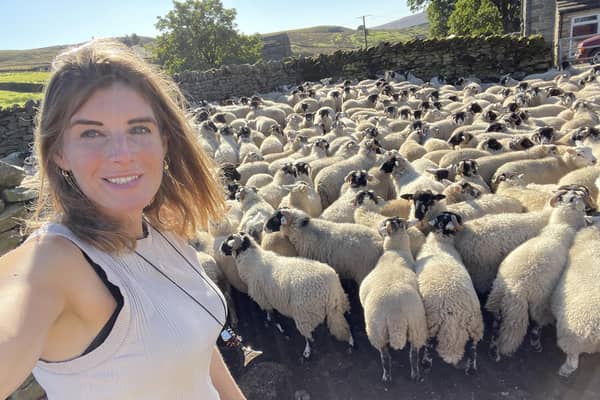 The Yorkshire Shepherdess, Amanda Owen, with some of her Swaledale flock.