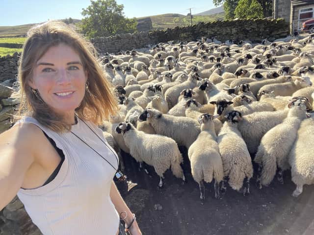 The Yorkshire Shepherdess, Amanda Owen, with some of her Swaledale flock.
