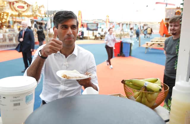 Rishi Sunak, seen having a pancake at a stall at the London Wonderground comedy and music festival, should recognise that some sectors, like events, creative arts and entertainment, need the furlough scheme to continue (Picture: Peter Nicholls - WPA Pool/Getty Images)