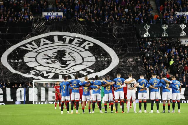 Rangers' players observe a minute's silence for legendary manager Walter Smith who passed away aged 73, during a Cinch Premiership match between Rangers and Aberdeen at Ibrox stadium, on October 26, 2021, in Glasgow, Scotland. (Photo by Alan Harvey / SNS Group)