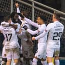 Livingston's Ayo Obileye celebrates with team-mates after making it 1-0 against Dundee United.