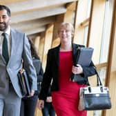 First Minister Humza Yousaf and Deputy First Minister Shona Robison (right) arrive for First Minister's Questions (FMQs) in the main chamber of the Scottish Parliament in Edinburgh