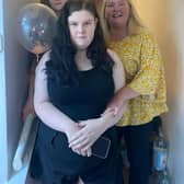 Charleen Morton, Chairperson of the National Autistic Society's Dundee branch, with her three daughters