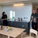 Mairi Gougeon MSP, the Scottish Government's Cabinet Secretary for Rural Affairs & Islands, Peter Smith of Roderick James Architects and Stuart Goodall in the Zero Carbon House.