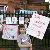 Campaigners have fought to get Whiteinch Library open for the past nine months. Tomorrow (Monday), it will finally open its doors.  Pictured are supporters Maureen Cannell (59) with  grand children, Mallory (5 months) and Mathew Gallacher, during the summer. PIC: John Devlin.