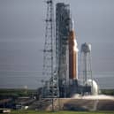 NASA's Space Launch System (SLS) rocket with the Orion spacecraft aboard is seen atop the mobile launcher at Launch Pad 39B